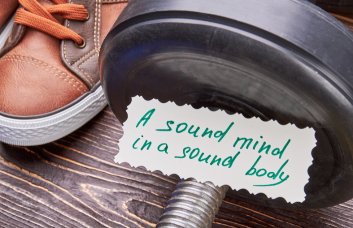  brown shoes, weights, and a piece of paper that describes a sound mind is a sound body
